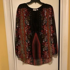 Red blouse with floral print.